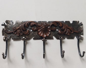 Wrought iron hangertal with the wooden dekor