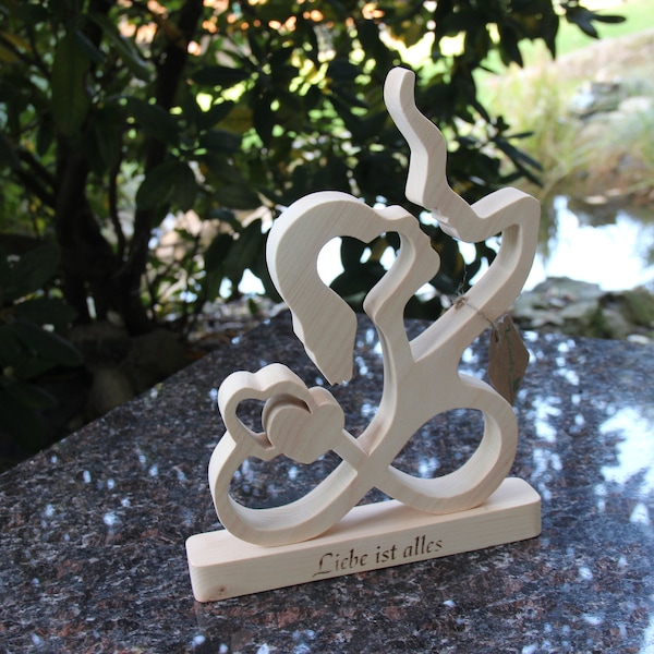 Wedding gift sculpture of lovers made of pine wood, also infinitely personalized