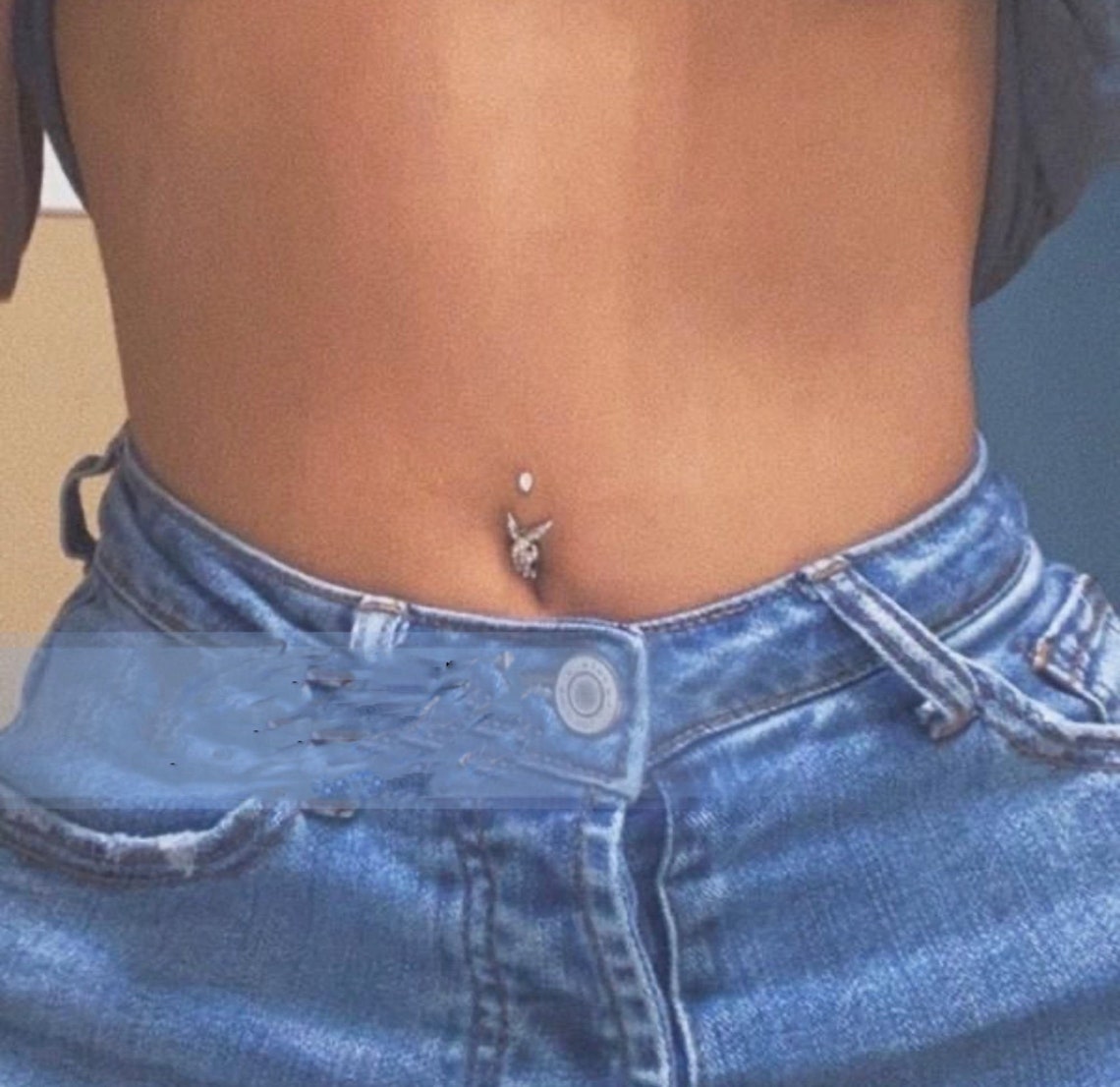 Piercing Your Own Belly Button