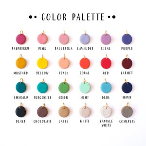 May include: Color palette chart with 18 different colored round ceramic charms with gold jump rings. The colors include raspberry, pink, ballerina, lavender, lilac, purple, mustard, yellow, peach, coral, red, garnet, emerald, turquoise, green, mint, blue, navy, black, chocolate, latte, white, sparkle white, and concrete.