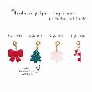 May include: Four handmade polymer clay charms for necklaces and bracelets. The charms are a red bow, a green Christmas tree, a white snowflake, and a red and white candy cane. Each charm has a gold jump ring.
