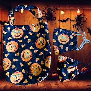 Wende-Halloween-Trick-or-Treat-Tasche: Kürbis & Candy Corn Tote mit Gesichtsmasken
