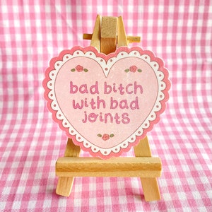 bad bitch with bad joints holographic vinyl waterproof sticker | cute, pretty, funny, chronic illness, disability, laptop, water bottle