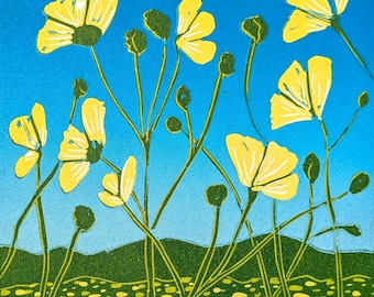 May include: A vibrant print of yellow flowers with green stems and buds against a bright blue sky. The artwork features a stylized landscape with a green field and distant hills, creating a cheerful, summery scene.