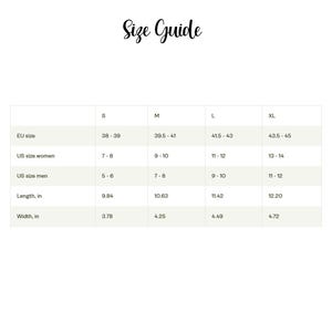 May include: A size guide chart with the heading Size Guide. The table lists sizes S, M, L, and XL with corresponding EU sizes, US sizes for women and men, and measurements for length and width in inches. The background is white with black text.