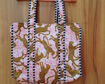 Bolso de mano acolchado de algodón estampado a mano: Bolso reversible con estampado floral indio.