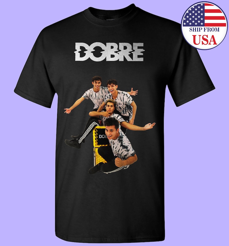 May include: Black t-shirt with a white graphic of the word "DOBRE" and a photo of four men. The men are wearing casual clothing and are posing in a playful manner.