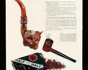 May include: Vintage advertisement featuring a tobacco pipe, a tobacco tin, and loose tobacco. The pipe is intricately carved with a bull's head design. The tobacco tin is green and black with the text "Half and Half".