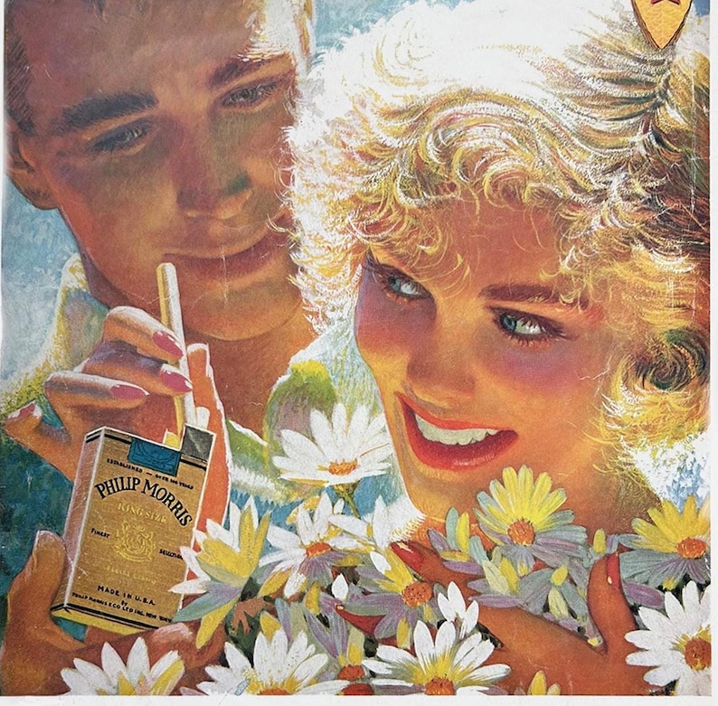 May include: Vintage advertisement featuring a man and woman, with the woman holding a bouquet of daisies. The man is holding a pack of Philip Morris cigarettes. The pack is gold and blue, with text that reads "Finest" and "Made in U.S.A."