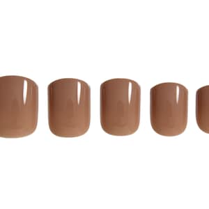 May include: A set of five press-on nails in a solid, glossy mocha brown color. Each nail features a rounded square shape with a smooth, reflective finish. The nails are arranged in a horizontal row, decreasing slightly in size from left to right.