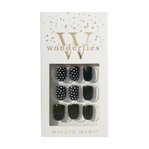 May include: A white rectangular box labeled wonderlies and MINUTE MANI containing nine press-on nails. The set features a mix of solid black nails and black nails with a white polka dot pattern arranged in a three-by-three grid display.