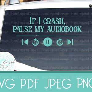 May include: A teal car window decal with the text "If I crash, pause my audiobook." Below the text are media control icons. The decal also includes the words "SVG PDF JPEG PNG".