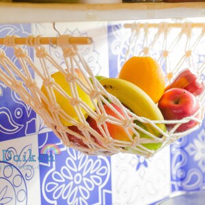 This lovely Handmade Macrame Hanging Fruit Basket is perfect for your Fruit Holder, Kitchen storage, Boho Home Decor, Kitchen Counter Saver in bohemian vibe. This could be a perfect idea for Gift for Mom, Housewarming Gift, New Home Gift.