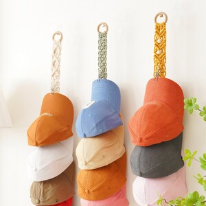 Ball cap store hanger