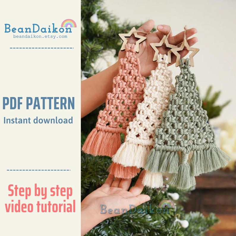 May include: Three macrame Christmas tree ornaments in pink, cream, and green with wooden star toppers. The ornaments are hanging from a Christmas tree.