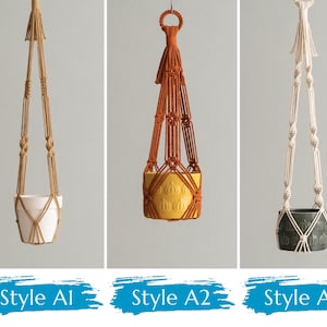 May include: Three macrame plant hangers with different styles. The first is a natural color with a white pot. The second is orange with a yellow pot. The third is white with a dark green pot.