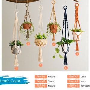 May include: Six macrame plant hangers in different colors, including natural, taupe, navy, terracotta, and latte. The hangers are made with cotton cord and have a tassel at the bottom. Each hanger is shown with a potted plant.