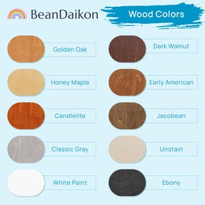 May include: A color chart titled BeanDaikon Wood Colors featuring ten oval wood swatches with labels: Golden Oak, Honey Maple, Candlelite, Classic Gray, White Paint, Dark Walnut, Early American, Jacobean, Unstain, and Ebony on a light blue background.
