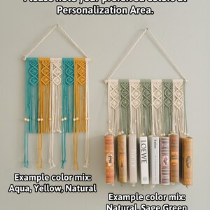 May include: Two macrame wall hangings with wooden dowels. The first is made with natural, yellow, and aqua coloured yarn. The second is made with natural and sage green yarn. Both hangings have wooden beads.