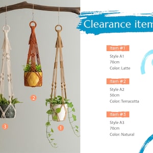 May include: Three macrame plant hangers with different colored cords and plants. The hangers are 50cm and 70cm long. The colors are latte, terracotta, and natural.