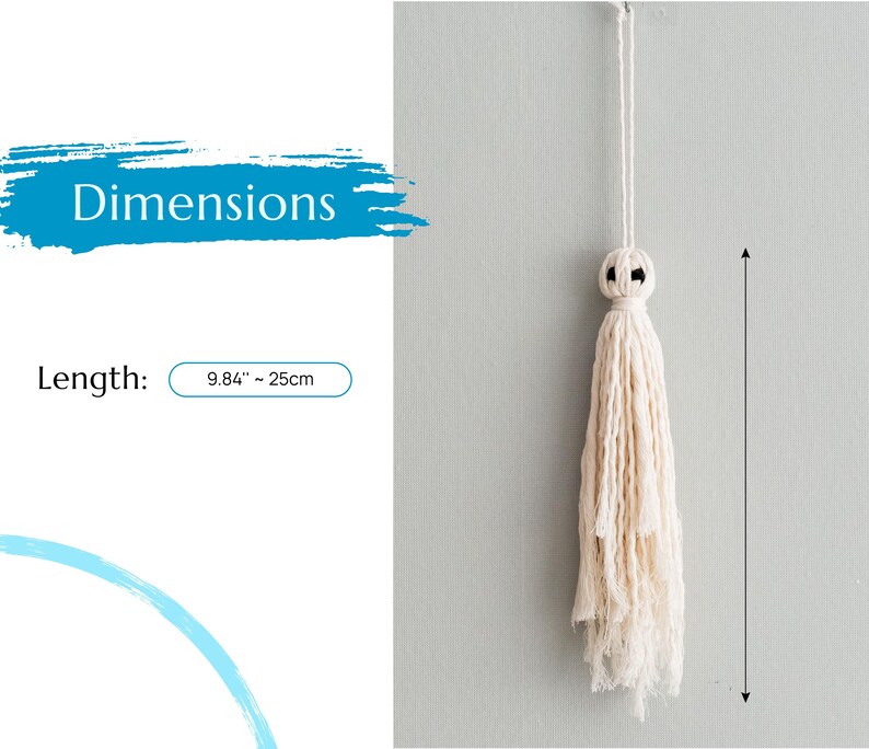 May include: A white cotton tassel with a black bead at the top. The tassel is 9.84 inches or 25 centimeters long.