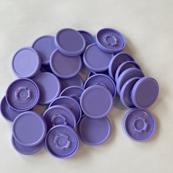 Light purple medicine vial caps
