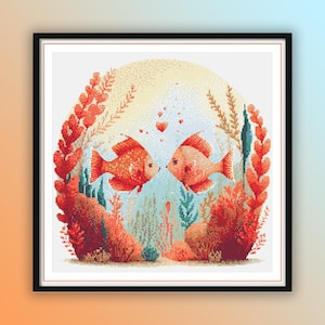 May include: Two orange fish with red fins are facing each other in a circle of coral and seaweed.  The fish are surrounded by small red hearts.