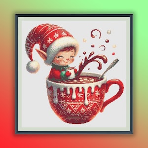 May include: A red and white Christmas elf with a red hat and green and white clothing is sitting in a red and white mug filled with hot chocolate. The hot chocolate is topped with whipped cream and marshmallows. The elf is smiling and holding a small cup of hot chocolate.