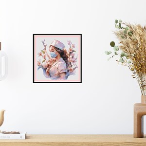 May include: A digital painting of a woman wearing a white nurse's uniform and a blue face mask. She is surrounded by pink flowers and has a gentle expression on her face.
