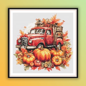 Puede incluir: Un camión vintage rojo con una cama de madera está lleno de calabazas y hojas de otoño. El camión está rodeado de calabazas y follaje de otoño.