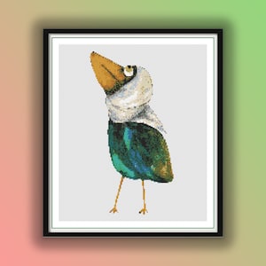 May include: A cross-stitch pattern of a cartoon bird with a white bandage around its head, wearing a green and blue patterned outfit, and standing on two legs.