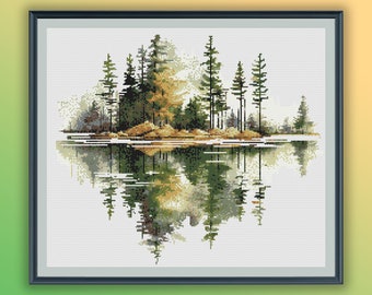 May include: A cross-stitch pattern depicting a serene lake scene with a small island covered in trees reflected in the water. The trees are a mix of green and brown, and the water is a light blue. The sky is a soft white.