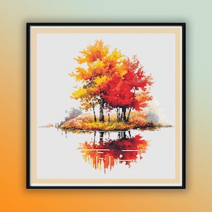May include: A cross-stitch pattern of a group of trees with orange, red, and yellow leaves reflected in a still body of water.