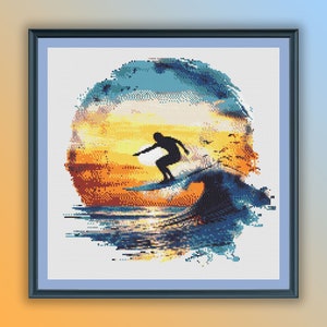 May include: A cross-stitch pattern of a silhouette of a surfer riding a wave at sunset. The wave is a vibrant blue and green, with a yellow and orange sunset in the background.