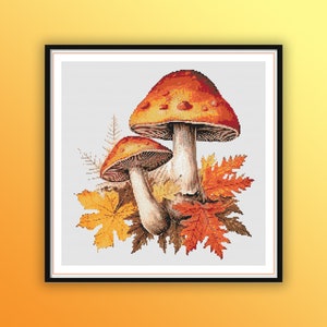 May include: Two red and orange mushrooms with white stems surrounded by orange and yellow autumn leaves.