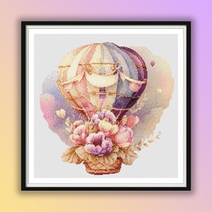 May include: A watercolor painting of a hot air balloon with pink, white, and blue stripes. The balloon is filled with a bouquet of pink and white flowers. The balloon is floating in a watercolor sky with clouds.