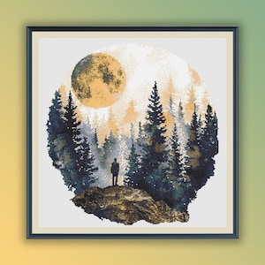 May include: A cross-stitch pattern featuring a silhouette of a person standing in a forest with a large, yellow moon in the background.