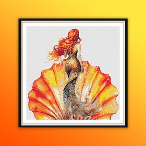 May include: A mermaid with long red hair sits inside a large, orange seashell. The mermaid's tail is a mix of brown and black scales. The seashell has a textured, layered appearance.