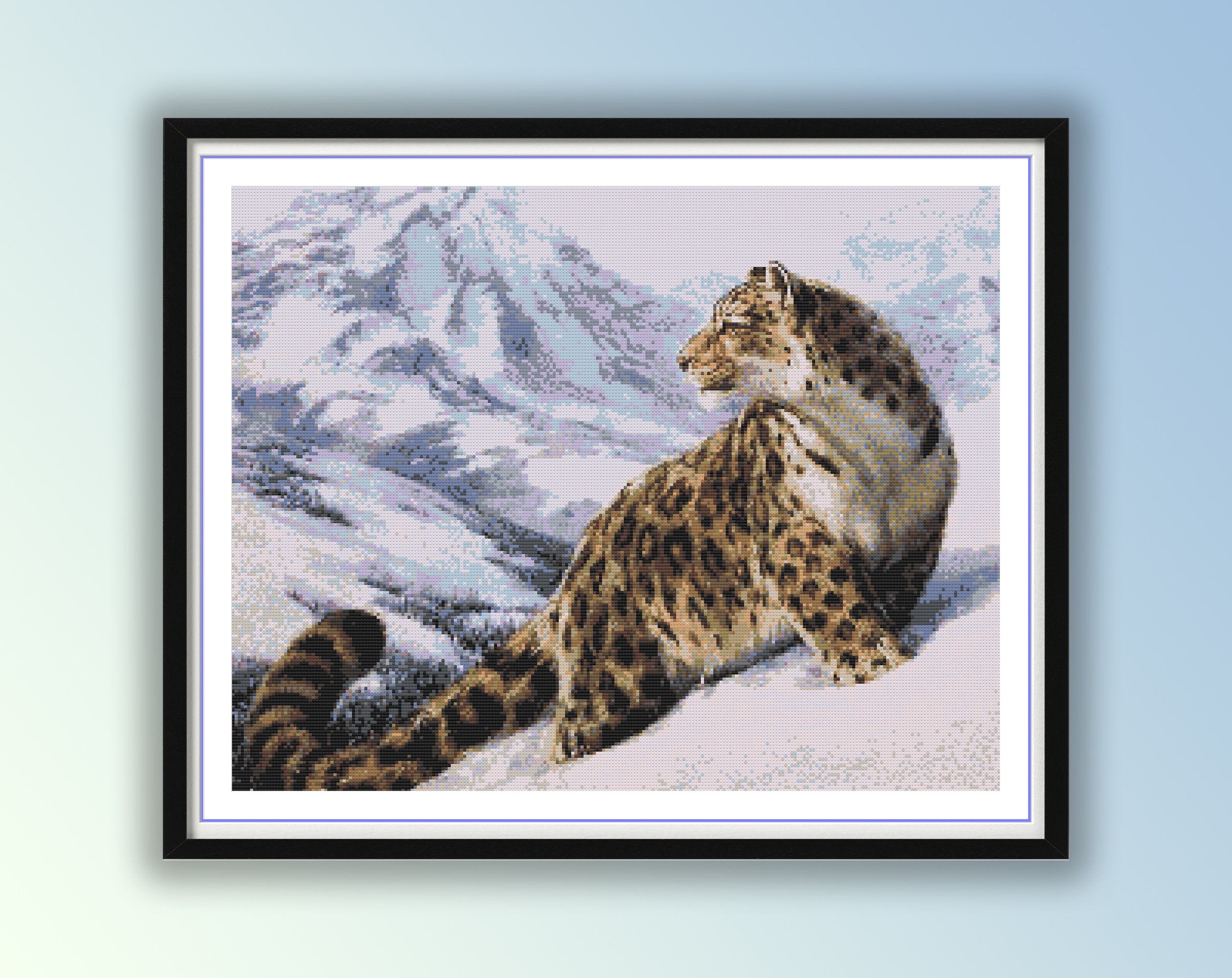 冬の山の風景に描かれたユキヒョウのクロスステッチ図案 - 野生動物