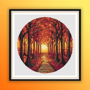 May include: A circular cross-stitch pattern of a path leading through a forest of trees with orange and red leaves. The sun is shining through the trees, creating a warm glow.