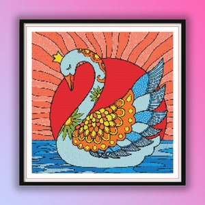 May include: A colorful, stylized illustration of a swan with a crown on its head. The swan is swimming in a blue body of water with a red sun rising behind it. The swan's feathers are decorated with intricate patterns in shades of blue, yellow, orange, and green.