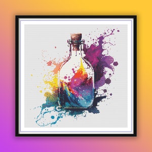 May include: A glass bottle with a cork stopper filled with colorful abstract paint splatters. The bottle is surrounded by more paint splatters in shades of purple, blue, yellow, and orange.