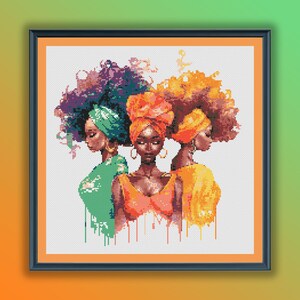 May include: Three women with colourful head wraps and flowing hair, painted in a vibrant style with dripping paint effects.