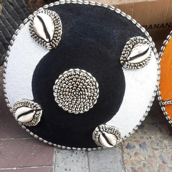 african shield covered with pearls, Bamileke mask with Mokamga beads, zulu shield