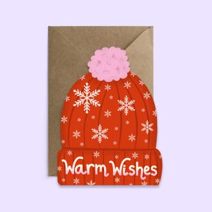 Pour les Fêtes d'hiver de voeux chaleureux | Carte de Noël | pour les Fêtes en forme de chapeau d'hiver de Zazzle.be Liste d'envies Vous avez des idées ? Carte Bonnet à pompons