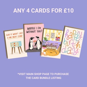 May include: Four greeting cards with different designs. The first card has a blue and white nightstand with the text "Glad it wasn't just a one night stand". The second card has two penguins with the text "Waddle I do without you?". The third card has a lion in a wicker basket with the text "New Baby". The fourth card has the text "Happy birthday" in rainbow colors.