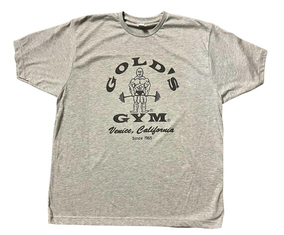 GOLD'S GYM （アメリカンフットボール型）シャツ 65 Men's Golds Gym 1965 Logo Color Vintage Military Soft Style Retro