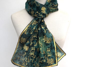 Handgeschilderde zijden sjaal met gouden katten, donkergroen, bruin, fairtrade