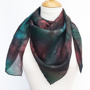 Square silk scarf in rich chocolate brown and green.
