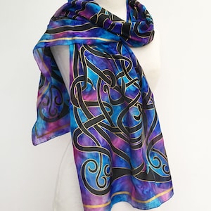 Long Celtic Silk Scarf in blues with a spash of pink. Also available as a Celtic silk scarf in strong vibrant pink.